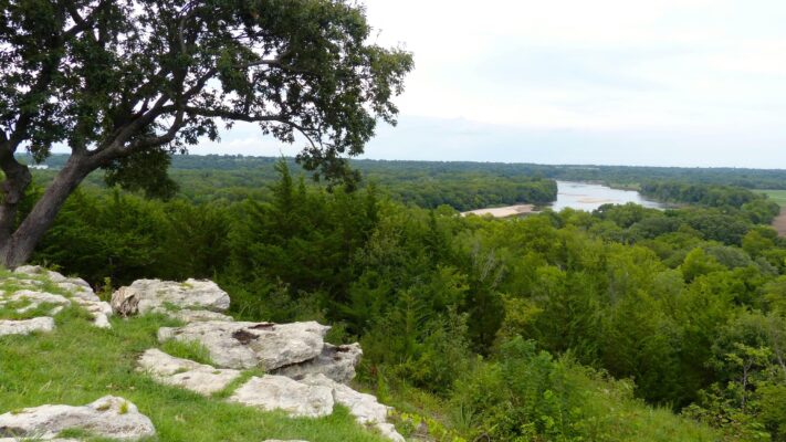 A rocky overlook to a river.